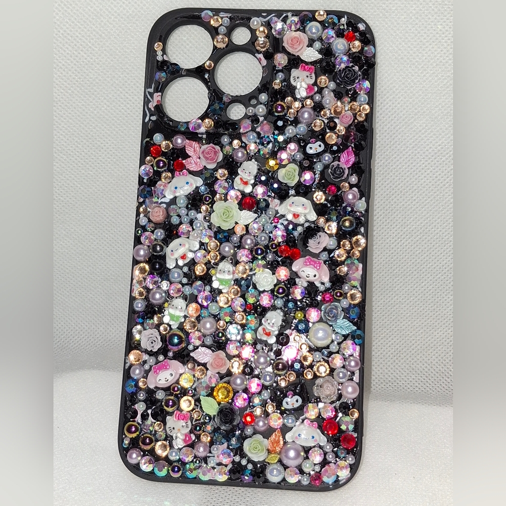 Black Rhinestone Phone Case with Sparkling Accents For Iphone 15 Plus.